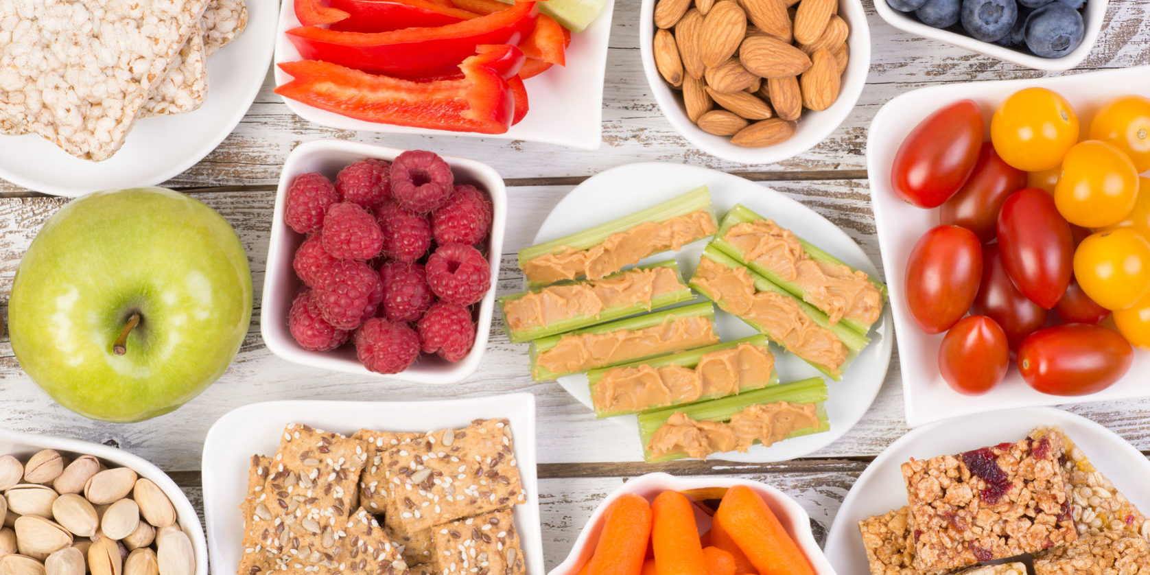 62914016 – healthy snacks on wooden table, top view