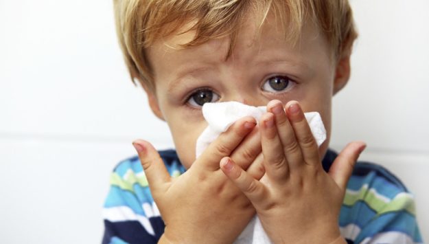 kid-blowing-nose-flk
